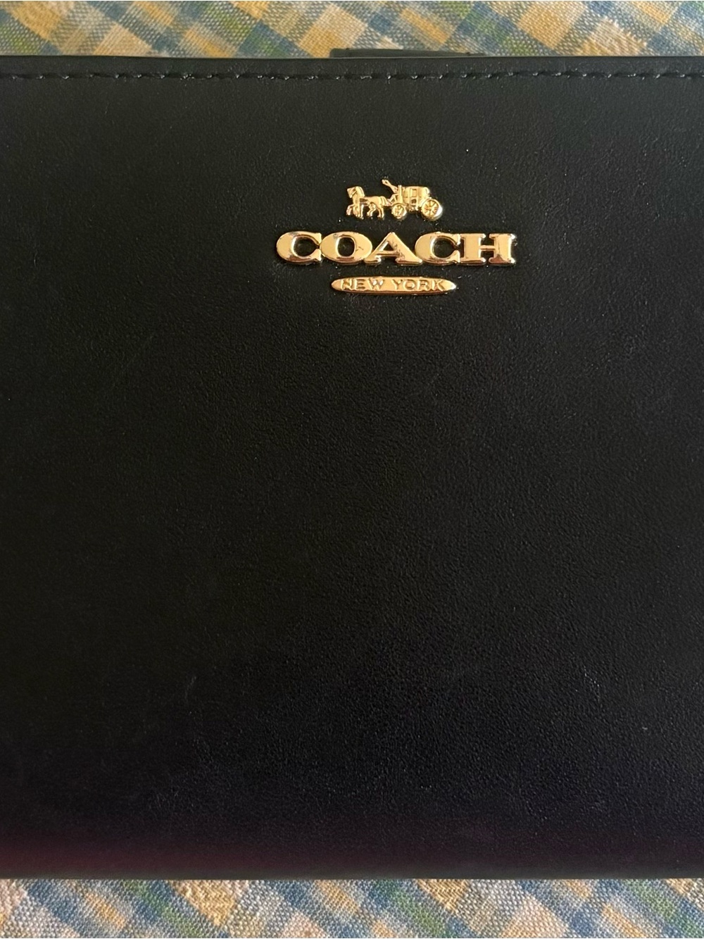 Coach Black Leather Bi-Fold Wallet with Gold Logo Accent